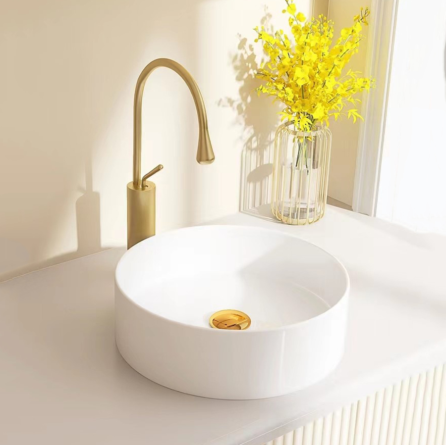 Großhandel im schlichten Stil, weißes, rundes Badezimmer aus Keramik über der Arbeitsplatte, Kunstwaschbecken, Handwaschbecken für zu Hause